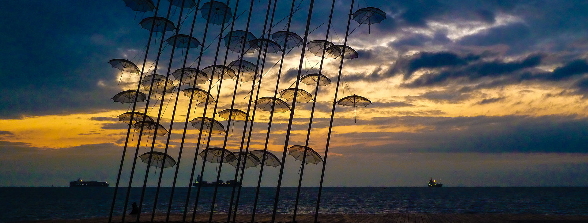 “Umbrellas” modern art statue during sunset at the seafront of Thessaloniki City